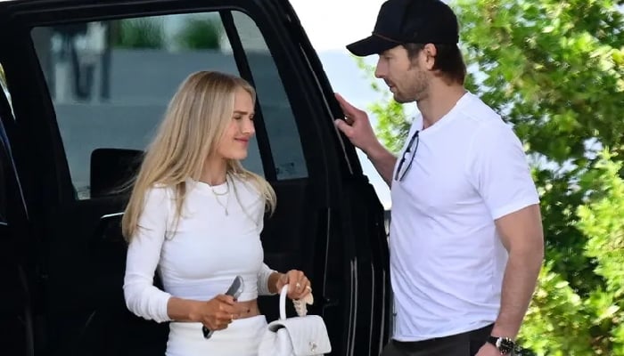 Glen Powell and Michelle Randolph