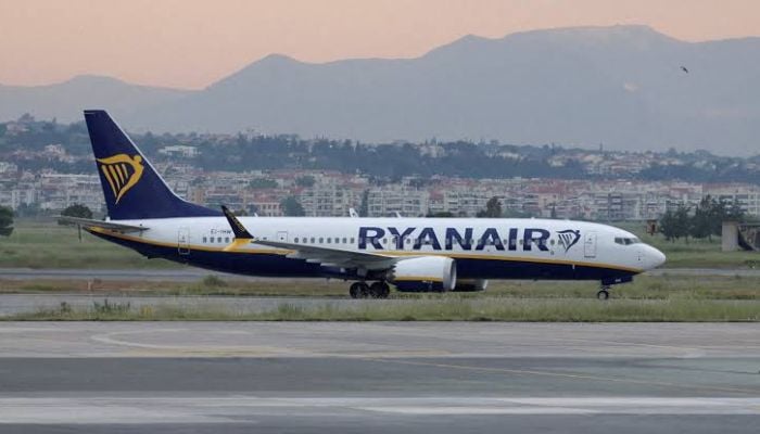 Passenger partially sucked out of plane during emergency landing in Greece