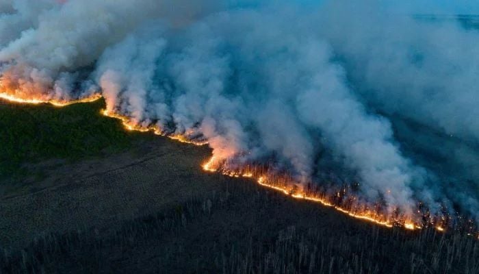 Wildfire smoke triggers unhealthy air alerts across the Midwest and East