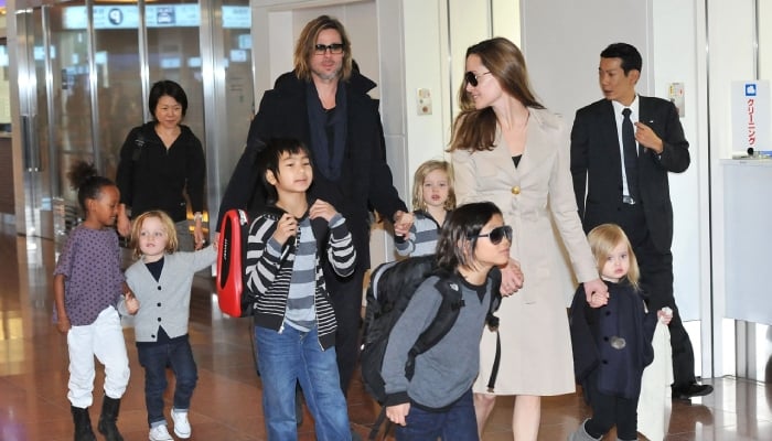 Angelina Jolie and Brad Pitt with their children