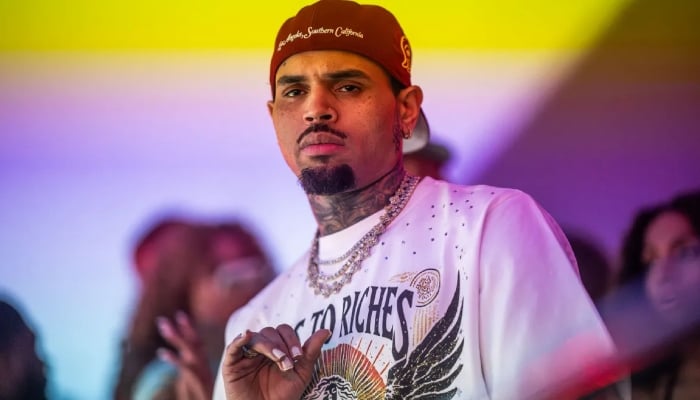 Chris Brown admits affray over bottle attack as major charges dropped