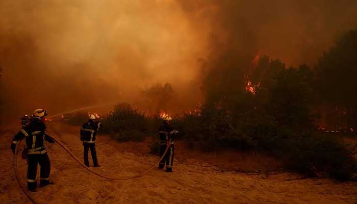 Nearly 270,000 evacuated as wildfires rage across Spain and France
