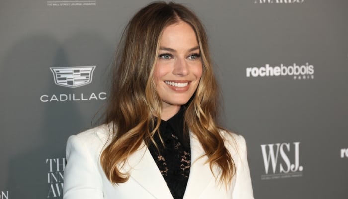 Margot Robbie brings effortless summer glam to new outing in chic yellow co-ord