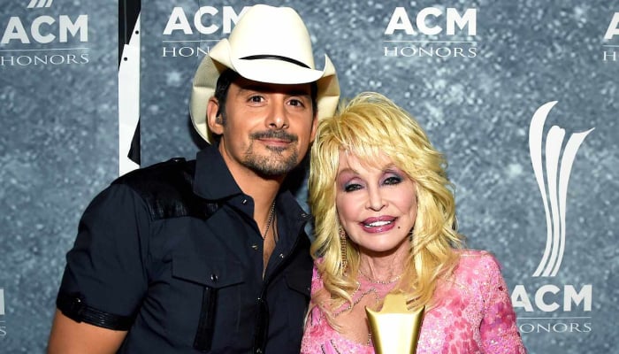 Brad Paisley gets teary-eyed while performing Dolly Parton duet without her