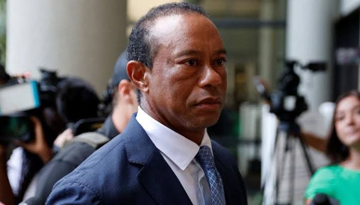 Golf icon Tiger Woods changes his plea in a Florida court as girlfriend Vanessa Trump offers her support