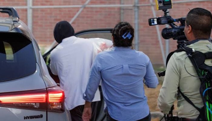 ICE officer charged with lying to federal prosecutors over shooting of Venezuelan man in Minnesota