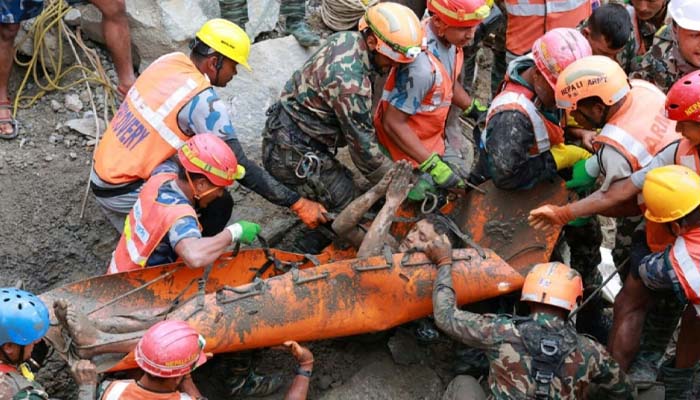 Nepal flood miracle: Crews rescue two workers from tunnel after nine days