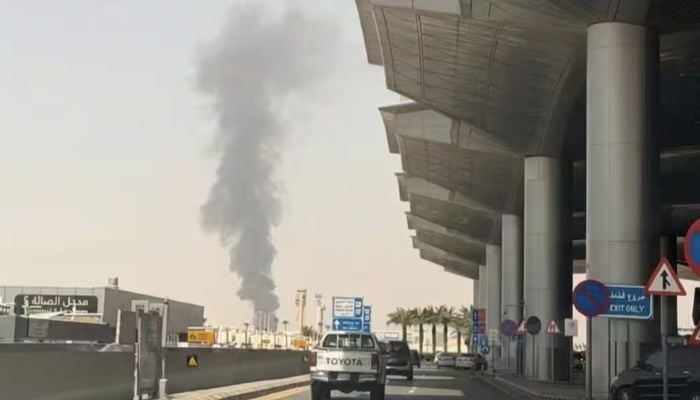 Heavy smoke and flight disruption reported following hostile aerial alerts