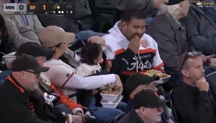 Over 80 million disgusted by viral Giants game clip of dad ignoring multitasking mom