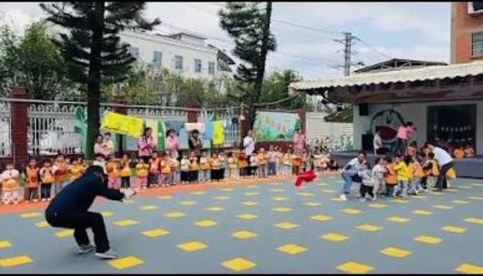 Clever security guard uses candy trick to win tug-of-war against kids in viral video
