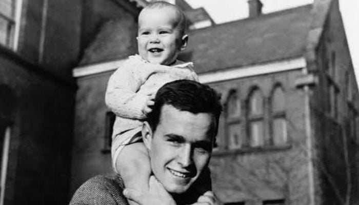 George H.W. Bush appears as a young naval aviator and Yale baseball captain