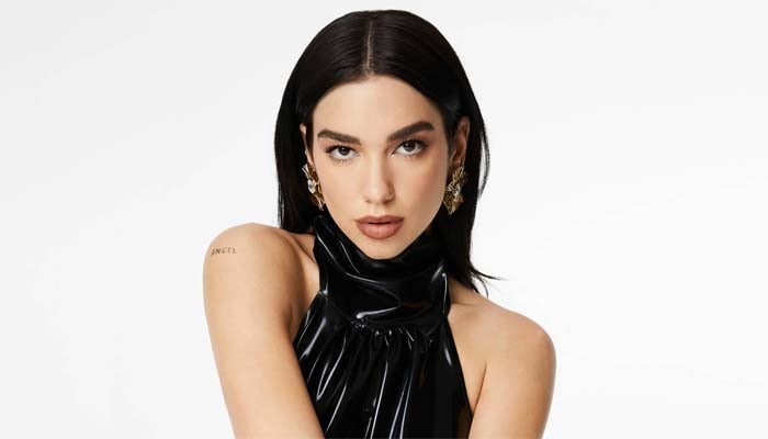 Dua Lipa’s glittering backless dress is the ultimate concert style moment: See her look