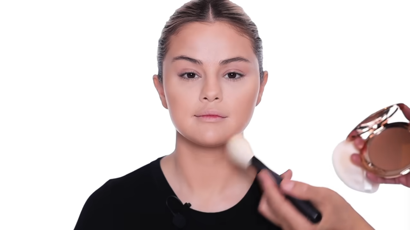 Enhance face shading with a touch of bronzer