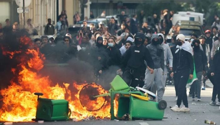 Why are 250,000 French students protesting? Riot police fire tear gas in 40+ cities