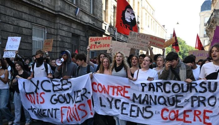 French riot police fire tear gas as 250,000 join nationwide student protests