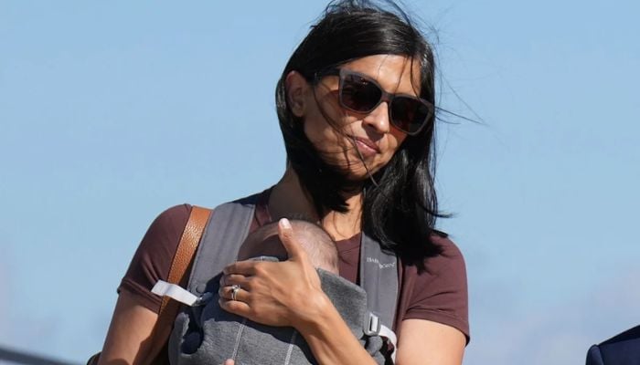 Usha Vance narrowly avoids a scary fall exiting a helicopter while holding infant son
