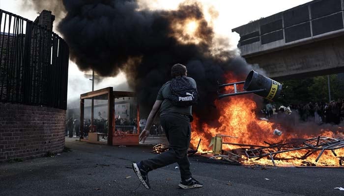 France protests turn violent as over 200 arrested across country