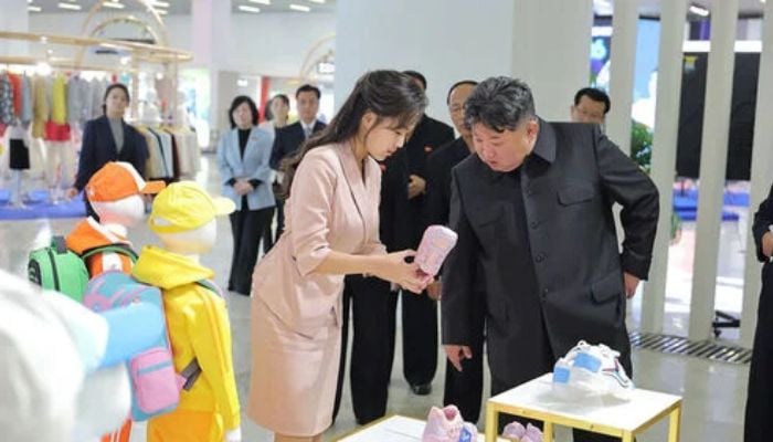 North Korean leader tours garment show after viral death claims